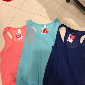 Three H&M tank tops